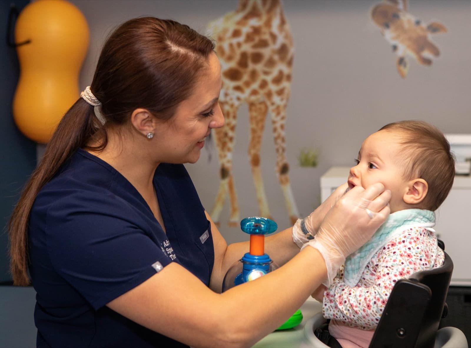 Clinician working one-on-one with a patient at ATWC