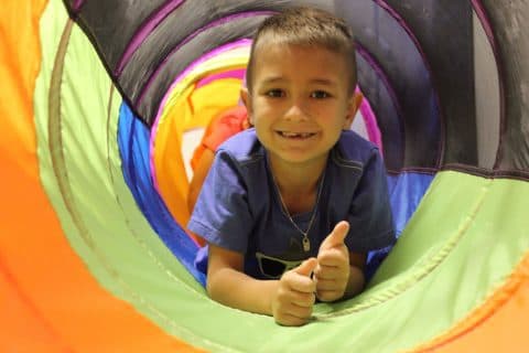Child in an occupational therapy session at Advanced Therapy & Wellness Center